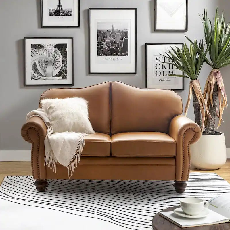 Canapé en cuir véritable de transition avec dossier capitonné